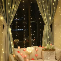 Svetelný záves s diaľkovým ovládačom 300 LED USB - teplá biela