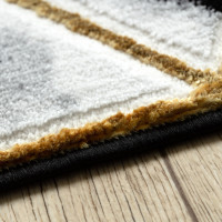 Kusový koberec Allure 1966 black/gold