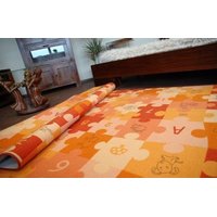 Detský koberec PUZZLE oranžový