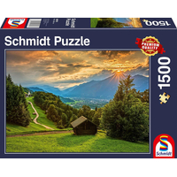 SCHMIDT Puzzle Západ slnka nad horskou dedinou Wamberg 1500 dielikov