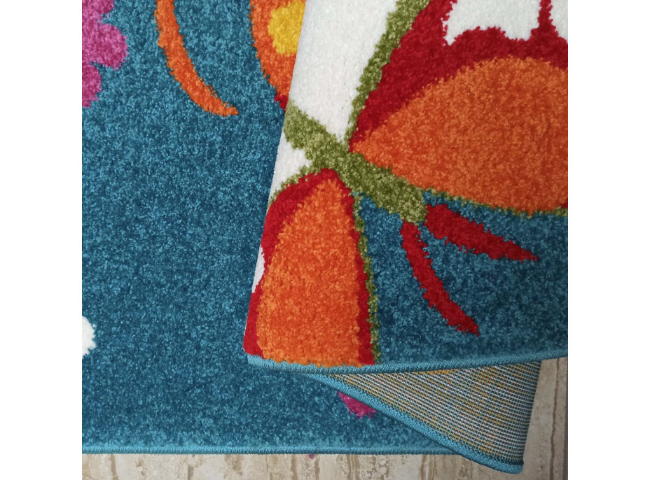 Detský koberec Farební motýle - modrý