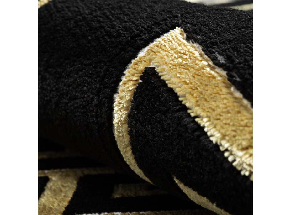 Kusový koberec Allure 1968 black/gold