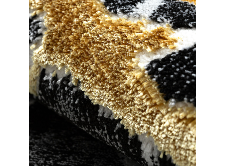 Kusový koberec Allure 1963 black/gold