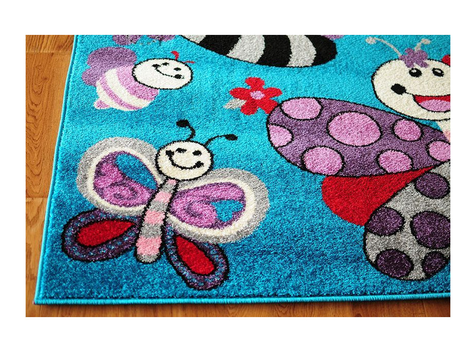 SKLADEM: Dětský koberec MOTÝLI - tyrkysový - 120x170 cm
